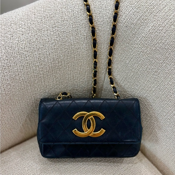 CHANEL Handbags - Authentic CHANEL black lambskin bicolor crossbody gold hardware